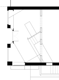 a floor plan of a house with stairs and a kitchen